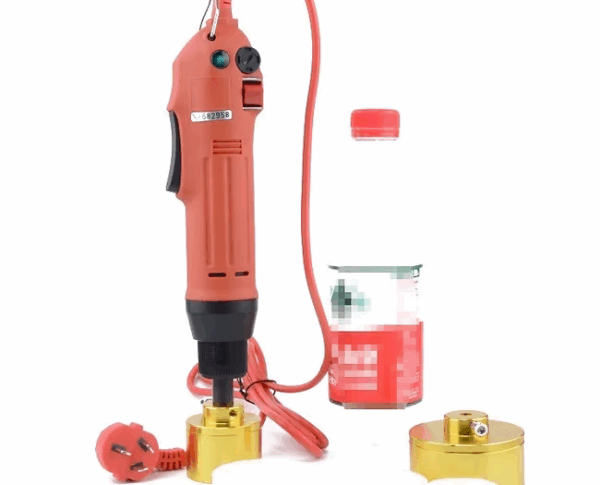 PLASTIC BOTTLE CAPPING MACHINE
